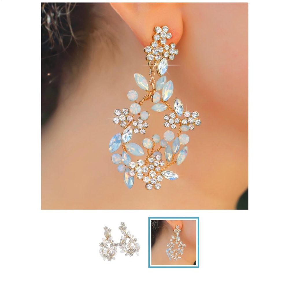Opal and crystal handmade earrings in gold.